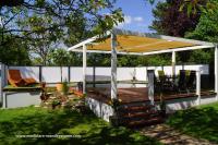 Modulare-Wandsysteme-Schwimmteich-mit-Terrasse-und-Beschattung